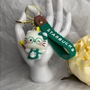 Starbucks Hello Kitty Keychain with Green and Gold Accents